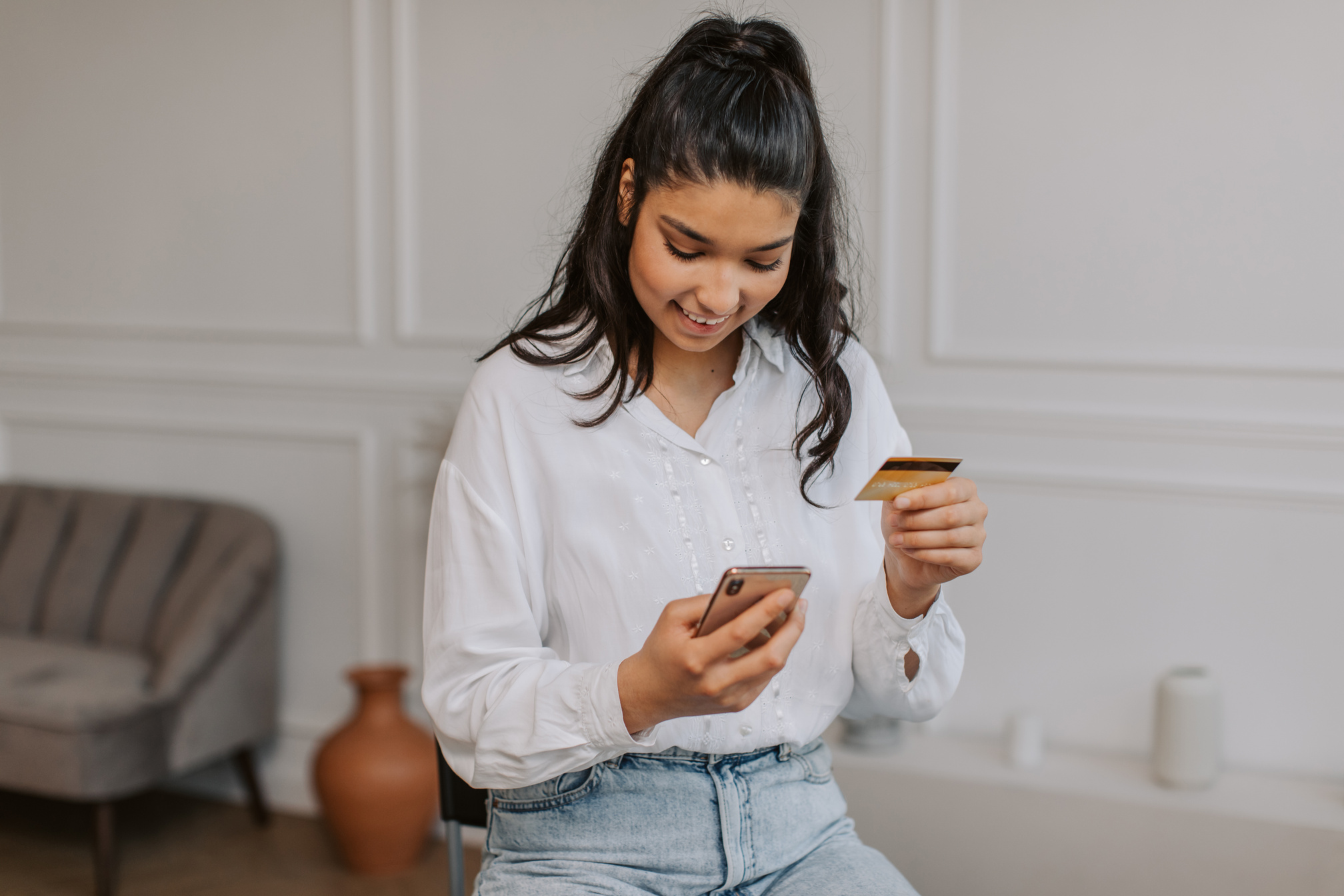 Woman Paying with Credit Card for Online Shopping